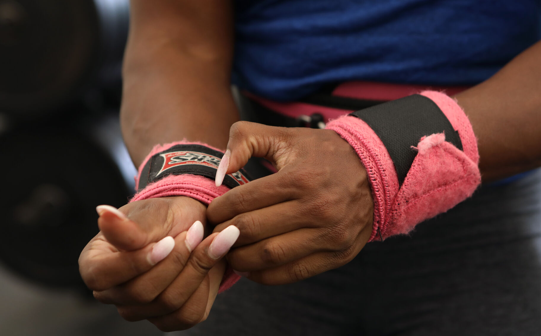 Nadia Wyatt wraps her wrists